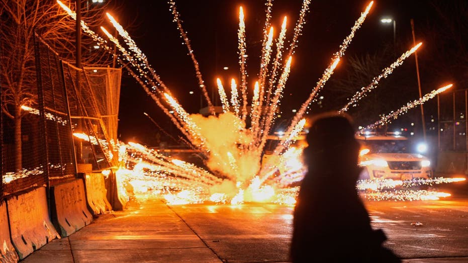 federal agents deploy tear gas, rubber bullets on protesters outside minneapolis federal building